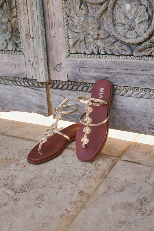 MIA Dorcie Strappy Sandals in gold with spiral straps and contoured footbed—perfect for summer style. FINAL SALE.